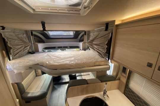 auto-trail-f70-interior-drop-down-bed-2.jpg