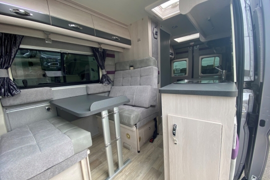 auto-sleepers-fairford-interior-dinette-to-rear.jpg