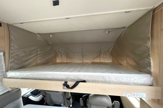 hymer-mci-580-interior-overcab-bed.jpg