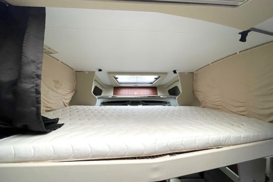 adria-matrix-supreme-670-interior-drop-down-bed.jpg