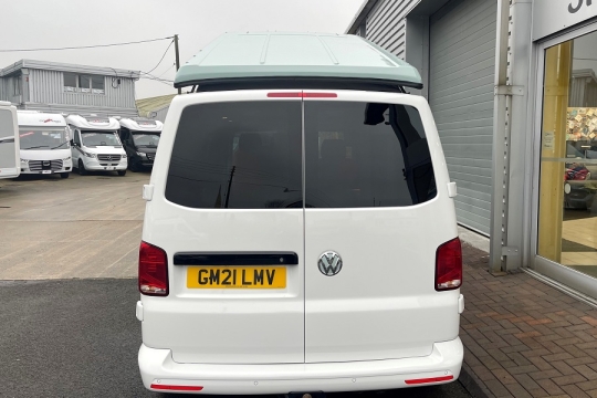 camperking-st-tropez-white-exterior-roof-up-rear.jpg